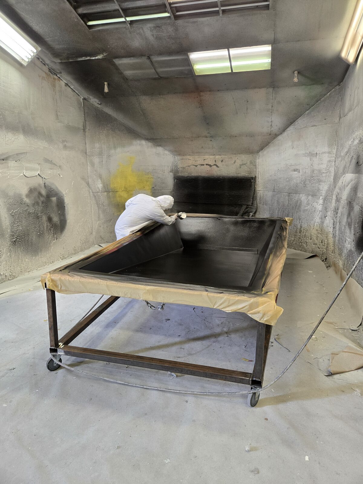 Prepping a mold in the booth