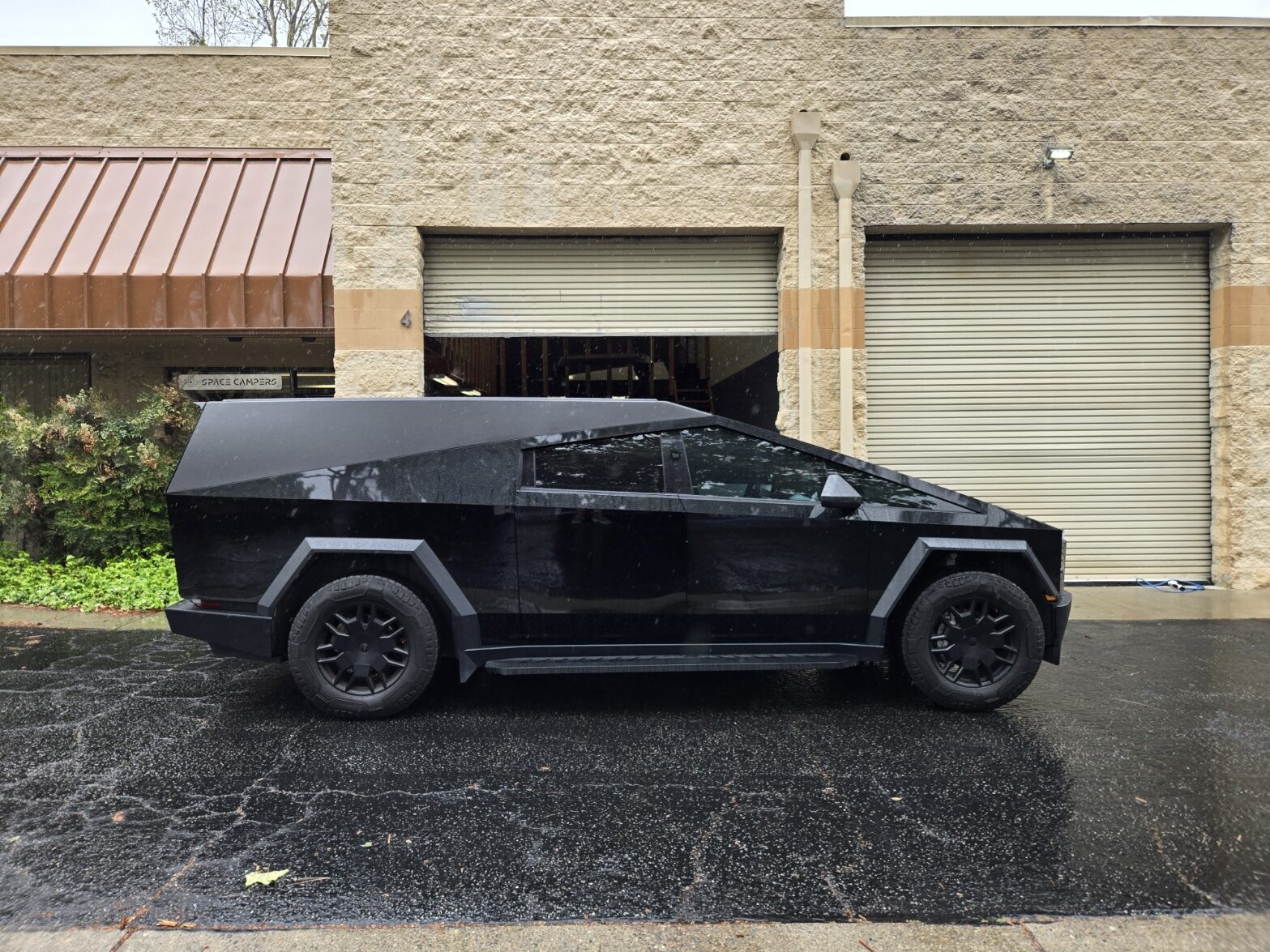Gloss black cap outside the shop