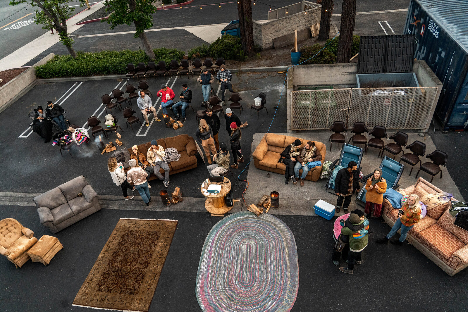 An outdoor community gathering in the lot