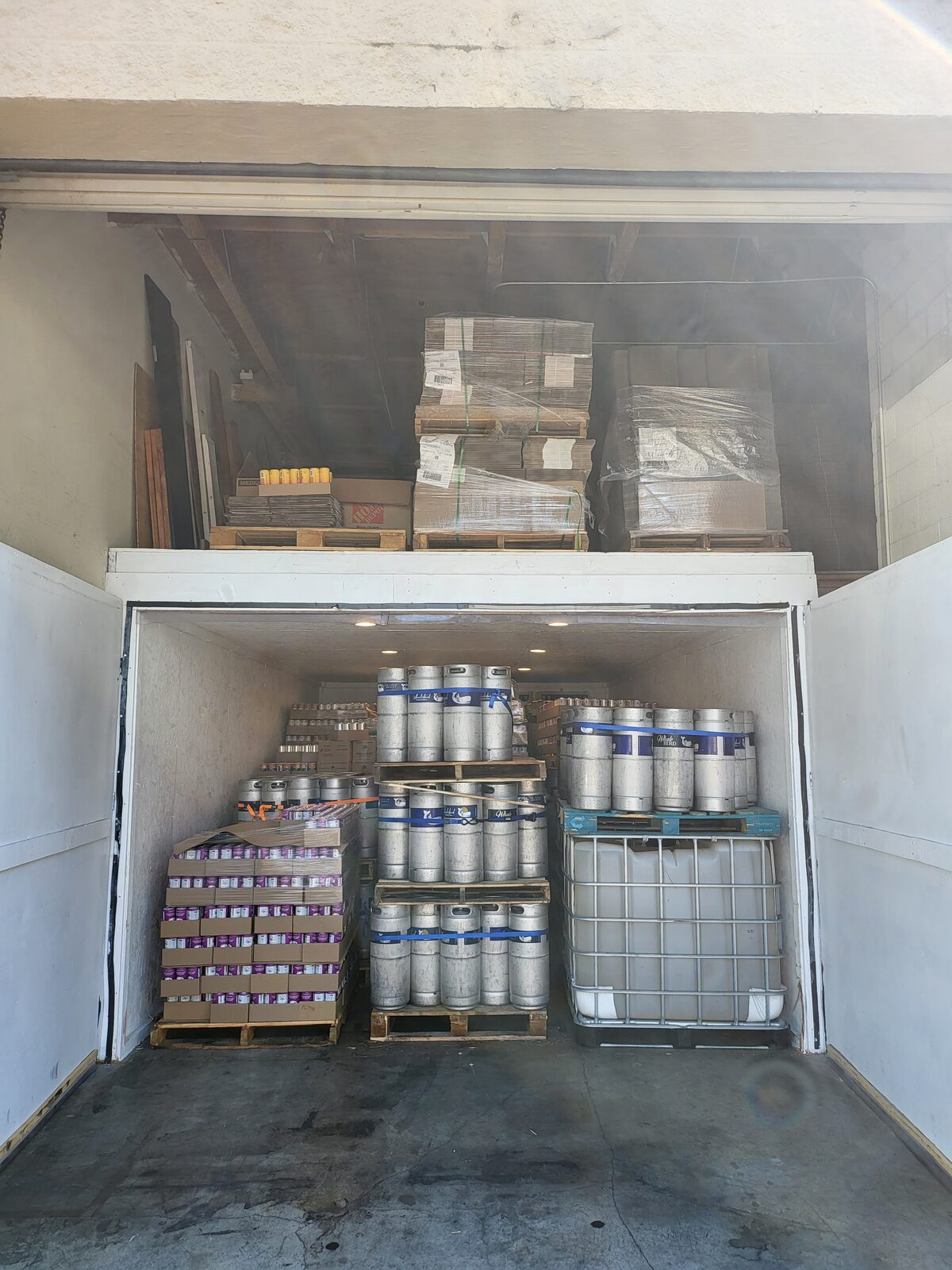 Finished fridge packed with kegs