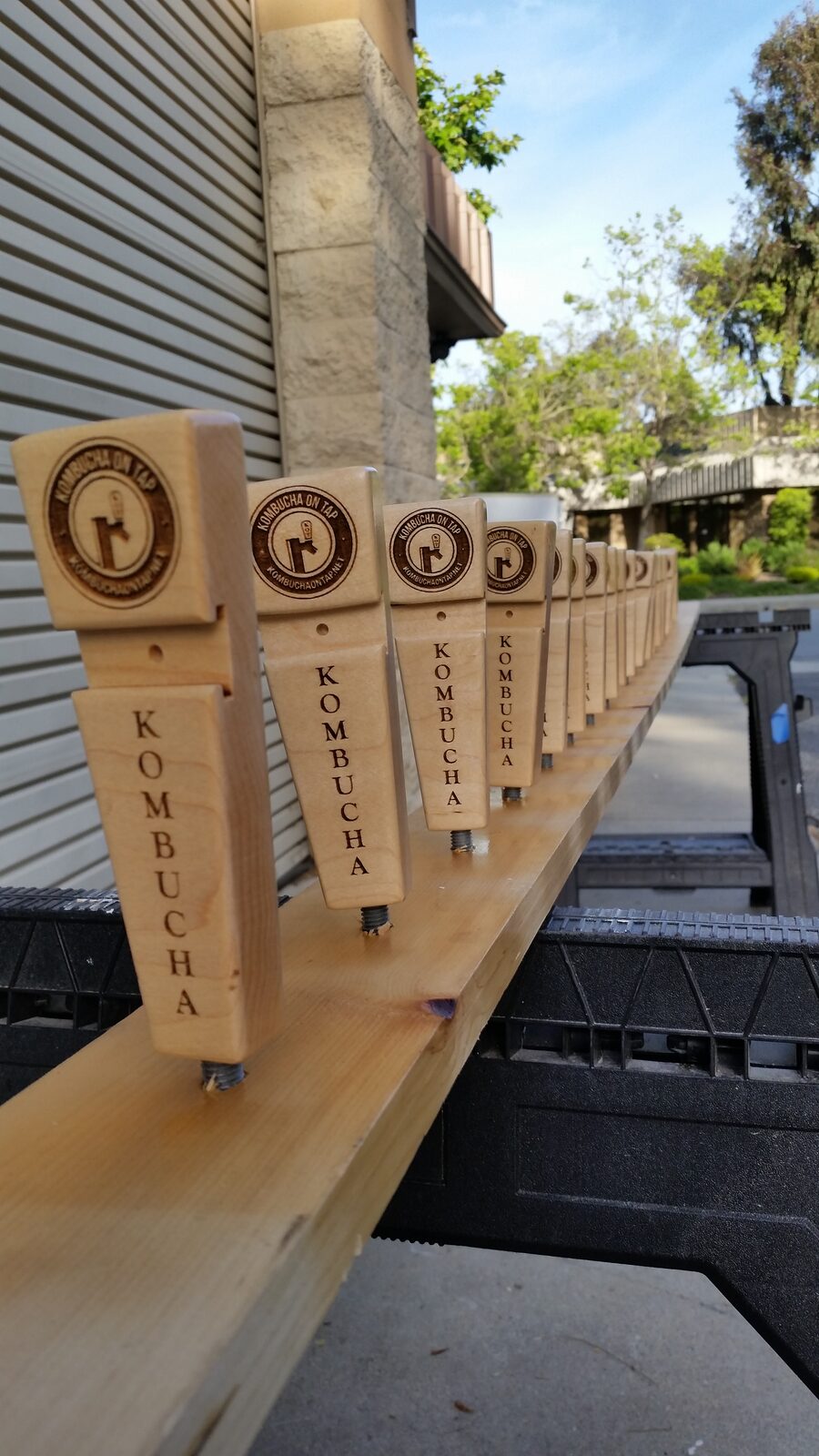 A lineup of maple tap handles